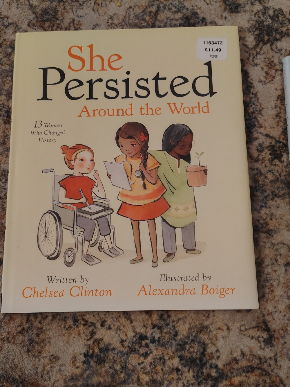 She Persisted Around the World by Chelsea Clinton - Cream & Orange Cover
